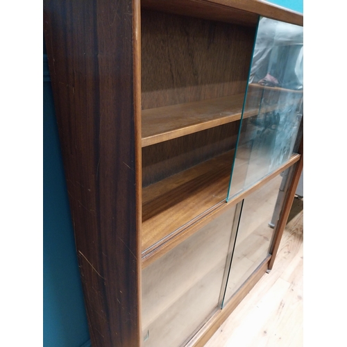 124 - Mid Century teak side cabinet with glass doors. {120 cm H x 92 cm W x 25 cm D}.