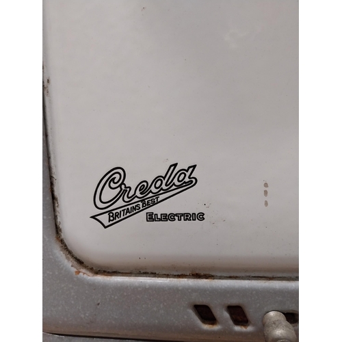 125 - 1950's Creda enamel cooker. {106 cm H x 59 cm W  x 47 cm D}.