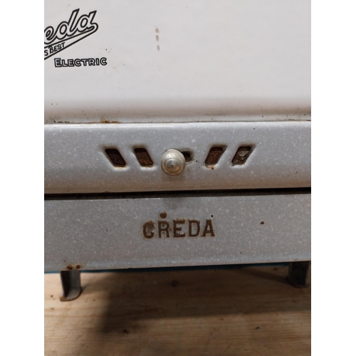 125 - 1950's Creda enamel cooker. {106 cm H x 59 cm W  x 47 cm D}.