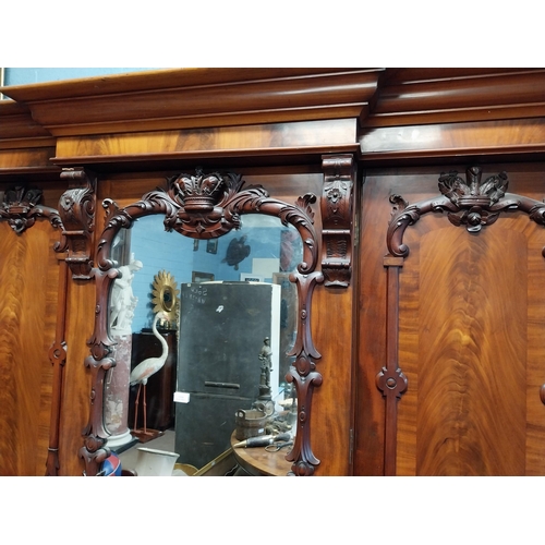 130 - 19th C. Mahogany three door wardrobe decorated with carved Prince of Wales feathers and crowns {201c... 