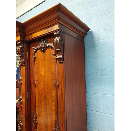 130 - 19th C. Mahogany three door wardrobe decorated with carved Prince of Wales feathers and crowns {201c... 