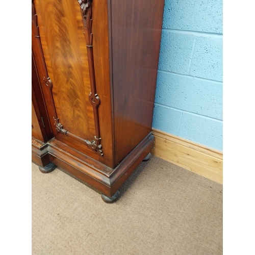 130 - 19th C. Mahogany three door wardrobe decorated with carved Prince of Wales feathers and crowns {201c... 