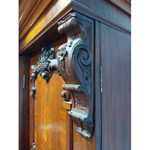 130 - 19th C. Mahogany three door wardrobe decorated with carved Prince of Wales feathers and crowns {201c... 