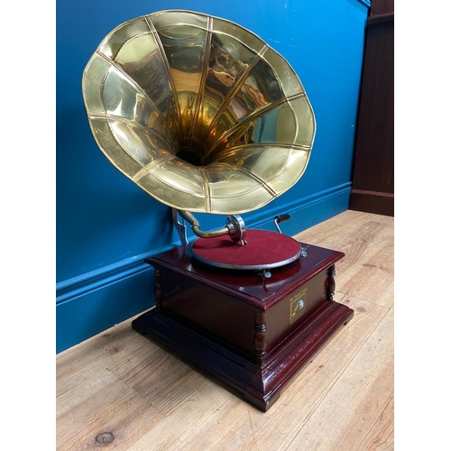 131 - His Master's Voice mahogany and brass gramophone. {70 cm H x 60 cm W x 60 cm D}.