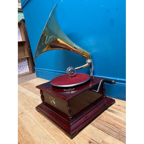 131 - His Master's Voice mahogany and brass gramophone. {70 cm H x 60 cm W x 60 cm D}.