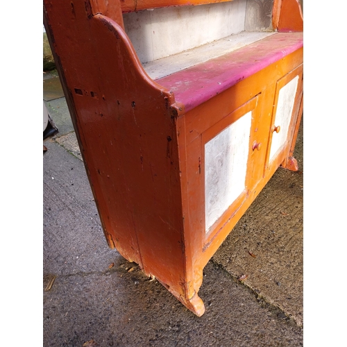 136 - 19th C. West of Ireland painted pine kitchen dresser with open shelf back above two doors on bracket... 