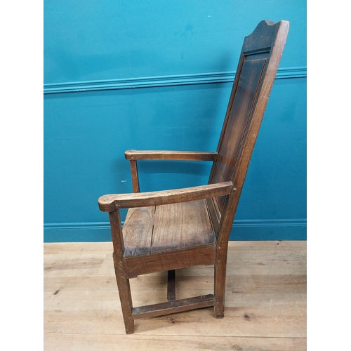 142 - 19th C. oak throne chair raised on square legs. {120 cm H x 60 cm W  x 63 cm D}.