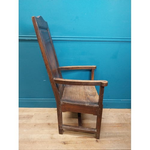 142 - 19th C. oak throne chair raised on square legs. {120 cm H x 60 cm W  x 63 cm D}.