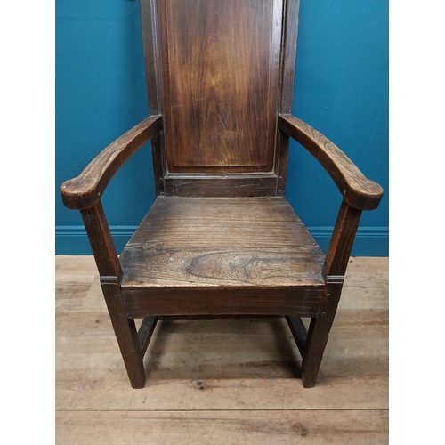 142 - 19th C. oak throne chair raised on square legs. {120 cm H x 60 cm W  x 63 cm D}.