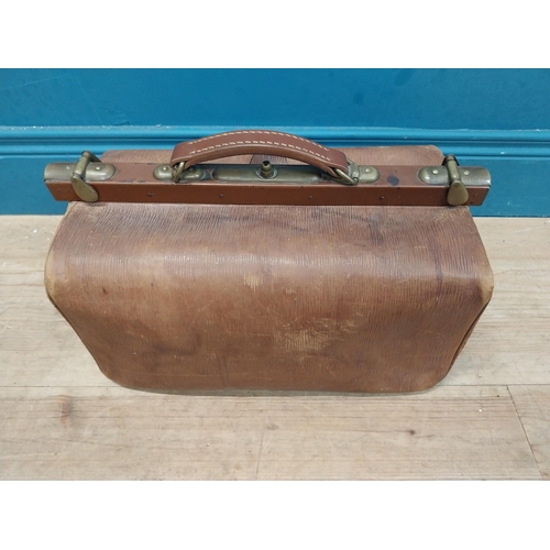 143 - Early 20th C. leather Gladstone bag. {27 cm H x 72 cm W x 23 cm D}