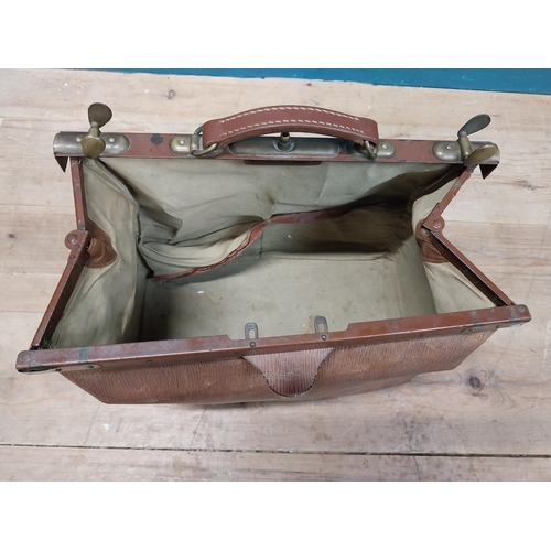 143 - Early 20th C. leather Gladstone bag. {27 cm H x 72 cm W x 23 cm D}