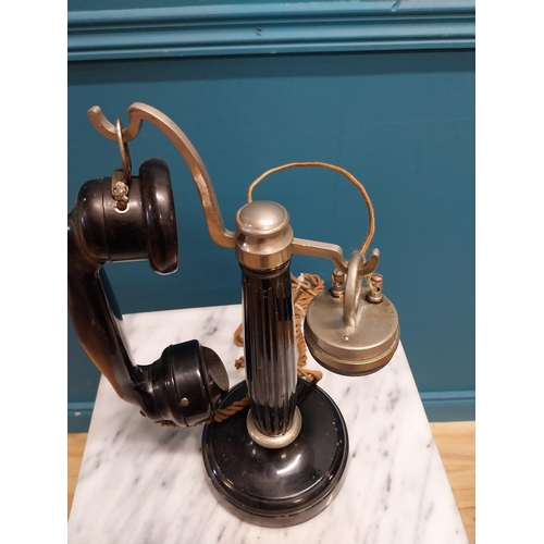 144 - Early 20th C. painted metal and chrome telephone. {36 cm H x 21 cm W x 14 cm D}.