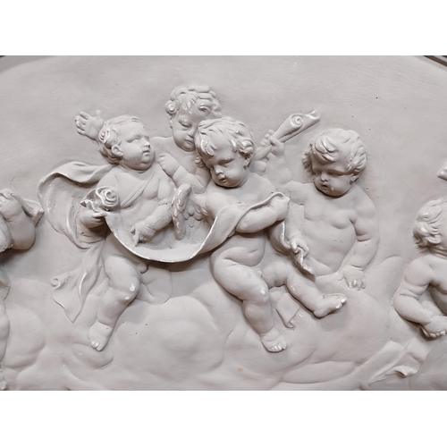 151 - Plaster wall plaque in the Classical style depicting cherubs. {52 cm H x 117 cm W}.