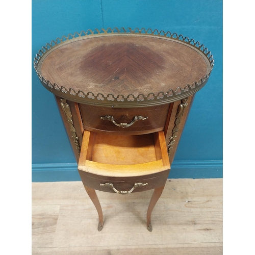 159 - Early 20th C. kingwood bedside cabinet with ormolu mounts above three drawers on shaped legs. {76 cm... 