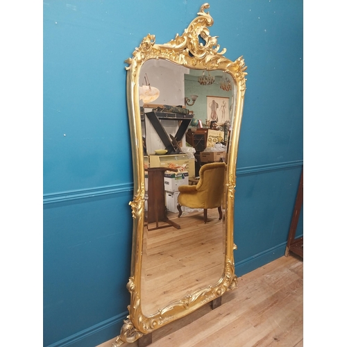 162 - 19th C. French giltwood pier mirror surmounted with flowers. {186 cm H x 102 cm W}.