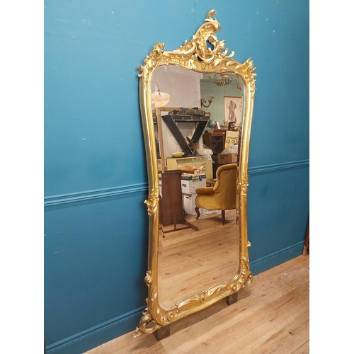 162 - 19th C. French giltwood pier mirror surmounted with flowers. {186 cm H x 102 cm W}.