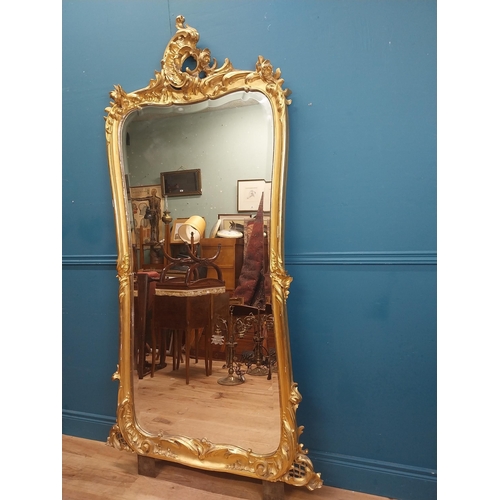 162 - 19th C. French giltwood pier mirror surmounted with flowers. {186 cm H x 102 cm W}.