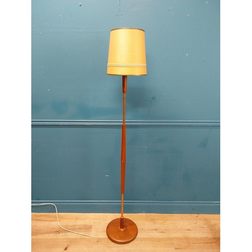 182 - Mid century teak and copper standard lamp with cloth shade. {107 cm H x 30 cm Dia.}.