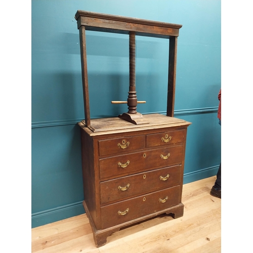 185 - 19th C. oak linen press above chest of drawers with three short drawers above three long graduated d... 