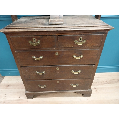 185 - 19th C. oak linen press above chest of drawers with three short drawers above three long graduated d... 