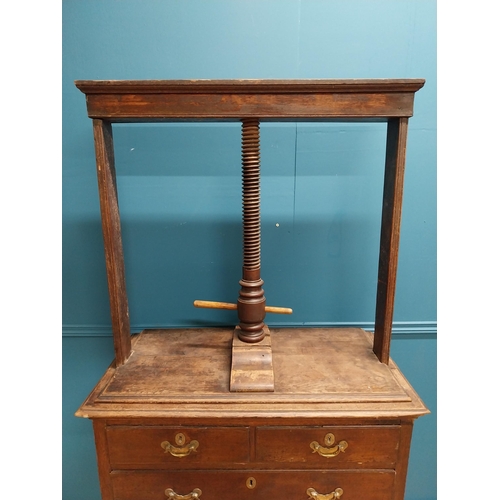 185 - 19th C. oak linen press above chest of drawers with three short drawers above three long graduated d... 