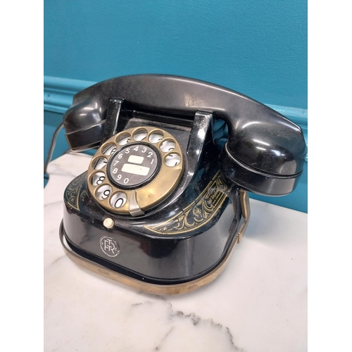 186 - 1950's brass and metal telephone. {14 cm H x 26 cm W x 15 cm D}.