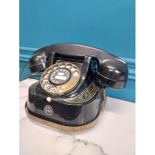 186 - 1950's brass and metal telephone. {14 cm H x 26 cm W x 15 cm D}.