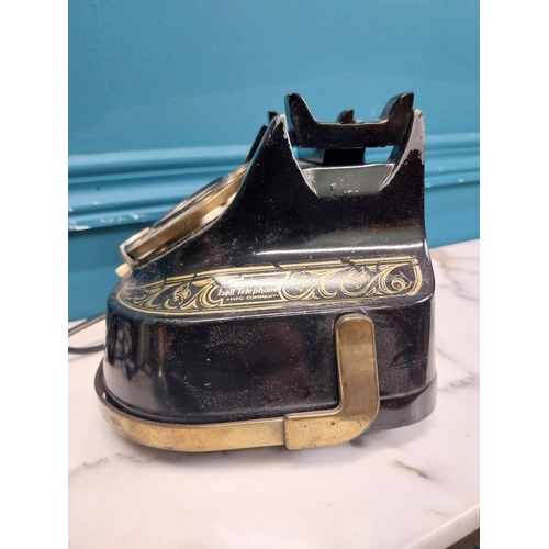 186 - 1950's brass and metal telephone. {14 cm H x 26 cm W x 15 cm D}.