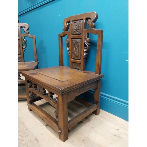 187 - Pair of Chinese hardwood chairs with scroll and leaf decoration. {75 cm H x 49 cm W x 41 cm D}.