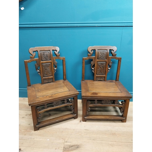 187 - Pair of Chinese hardwood chairs with scroll and leaf decoration. {75 cm H x 49 cm W x 41 cm D}.