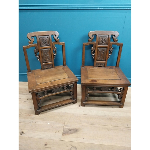 187 - Pair of Chinese hardwood chairs with scroll and leaf decoration. {75 cm H x 49 cm W x 41 cm D}.