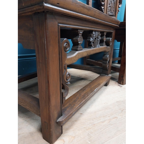 187 - Pair of Chinese hardwood chairs with scroll and leaf decoration. {75 cm H x 49 cm W x 41 cm D}.