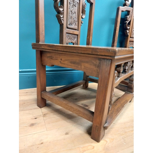 187 - Pair of Chinese hardwood chairs with scroll and leaf decoration. {75 cm H x 49 cm W x 41 cm D}.