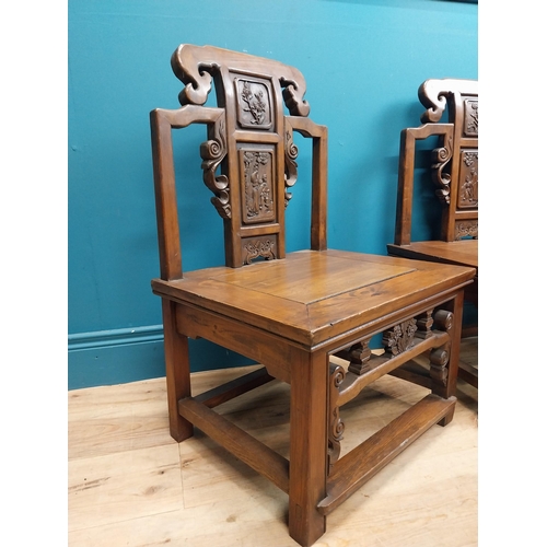 187 - Pair of Chinese hardwood chairs with scroll and leaf decoration. {75 cm H x 49 cm W x 41 cm D}.