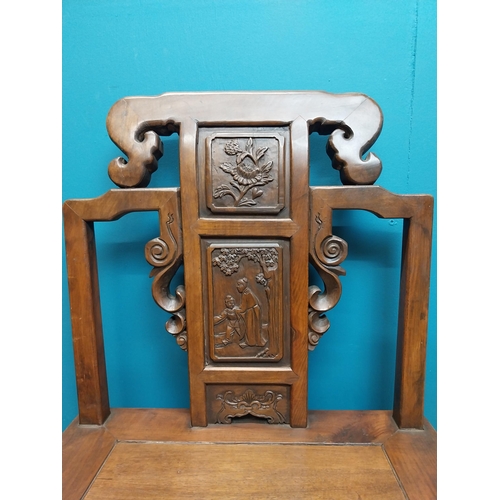 187 - Pair of Chinese hardwood chairs with scroll and leaf decoration. {75 cm H x 49 cm W x 41 cm D}.