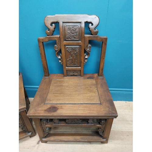 187 - Pair of Chinese hardwood chairs with scroll and leaf decoration. {75 cm H x 49 cm W x 41 cm D}.