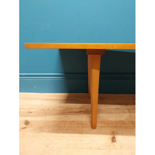 189 - Mid Century teak coffee table on square tapered legs. {34 cm H x 138 cm W x 46 cm D}.