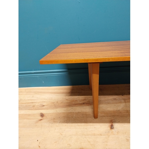 189 - Mid Century teak coffee table on square tapered legs. {34 cm H x 138 cm W x 46 cm D}.