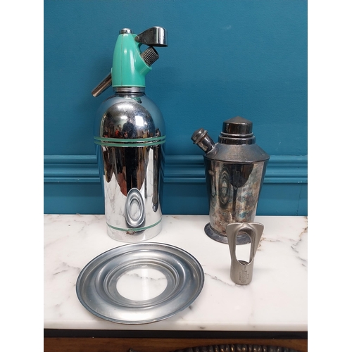 191 - 1950's chrome cocktail shaker and soda siphon.