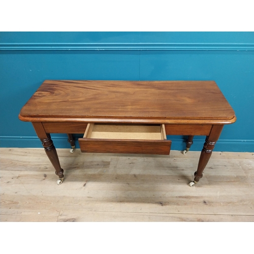 207 - 19th C. mahogany console table with single drawer in frieze. {74 cm H x 124 cm W x 49 cm D}.