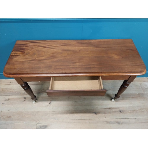 207 - 19th C. mahogany console table with single drawer in frieze. {74 cm H x 124 cm W x 49 cm D}.