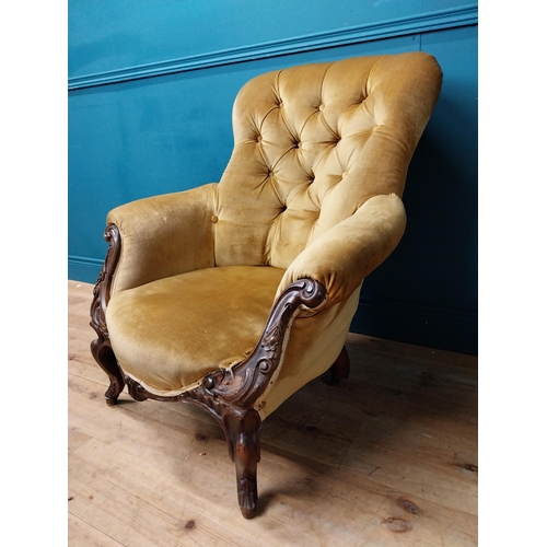 213 - 19th C. carved mahogany and upholstered armchair with shaped legs with brass feet. {92 cm H x 79 cm ... 