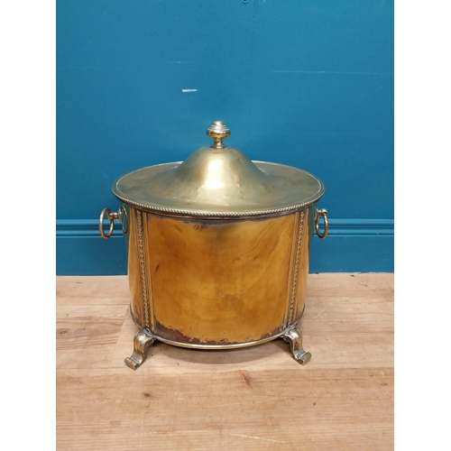 216 - Good quality brass lidded coal bucket with liner and handles on scrolled feet. {44cm H x 40 cm W x 3... 