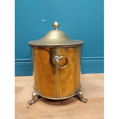 216 - Good quality brass lidded coal bucket with liner and handles on scrolled feet. {44cm H x 40 cm W x 3... 