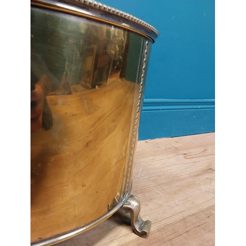 216 - Good quality brass lidded coal bucket with liner and handles on scrolled feet. {44cm H x 40 cm W x 3... 