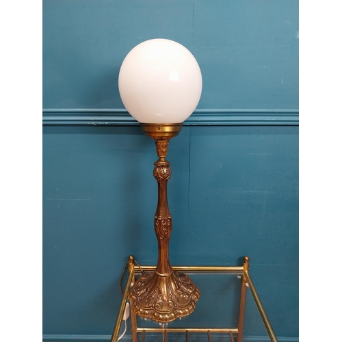 219 - Good quality brass column table lamp with opaline shade. {70 cm H x 43 cm Dia.}.