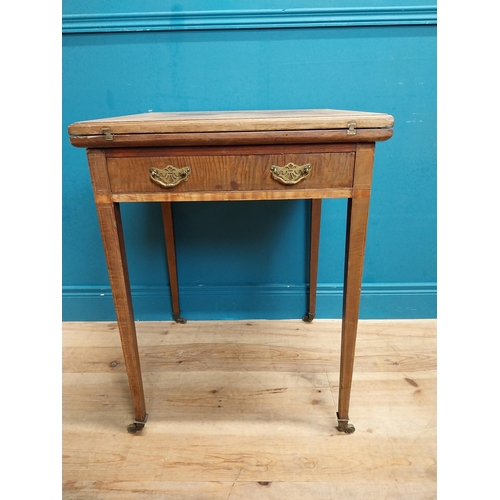 221 - 19th C. mahogany envelope card table with single drawer in frieze raised on tapered legs with caster... 