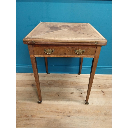 221 - 19th C. mahogany envelope card table with single drawer in frieze raised on tapered legs with caster... 