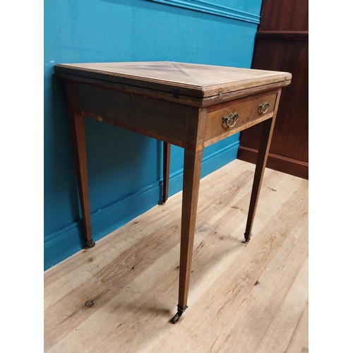 221 - 19th C. mahogany envelope card table with single drawer in frieze raised on tapered legs with caster... 