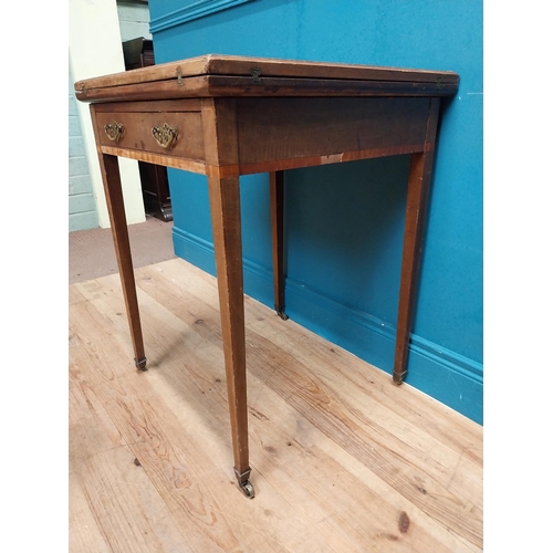 221 - 19th C. mahogany envelope card table with single drawer in frieze raised on tapered legs with caster... 